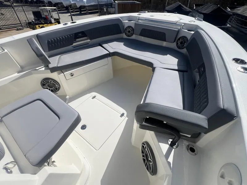 Slide: The Image of 2025 Cobia 285 Open Center Console boat with spacious seating and modern design. - 13