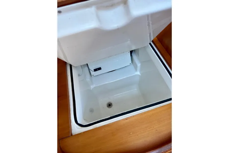 Slide: The Image of Open storage compartment on 2002 Beneteau Oceanis Clipper 311 sailboat. - 15