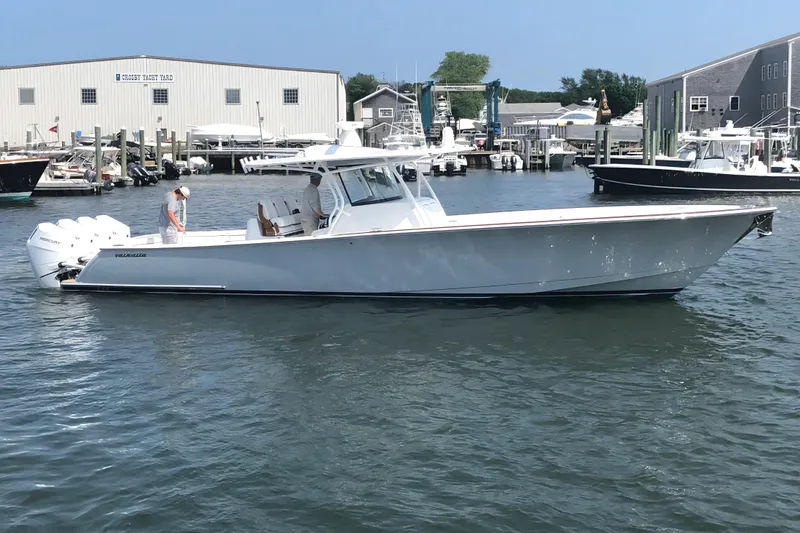 The Image of 2025 Valhalla Boatworks V-41 in marina, featuring sleek design and powerful engines. - 0