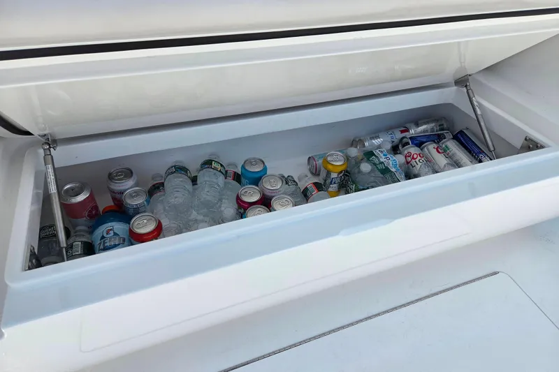 Slide: The Image of Cooler on 2025 Valhalla Boatworks V-41 filled with assorted drinks and water bottles. - 19