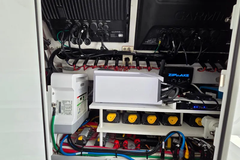 Slide: The Image of Electrical system of 2025 Valhalla Boatworks V-41, featuring Garmin and Zipwake components. - 27