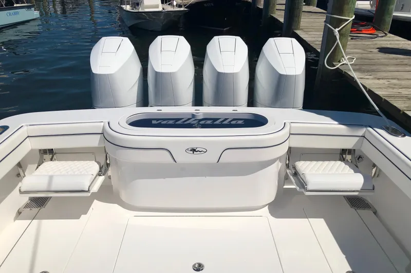 Slide: The Image of 2025 Valhalla Boatworks V-41 with four powerful outboard engines at dock. - 6