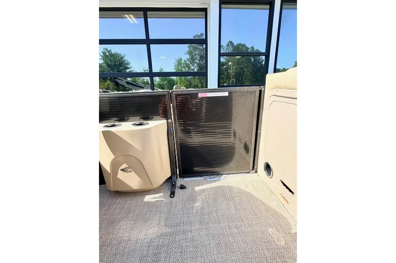Slide: The Image of Interior of 2021 Crest Classic DLX 220 SLC pontoon boat with seating and cup holders. - 9
