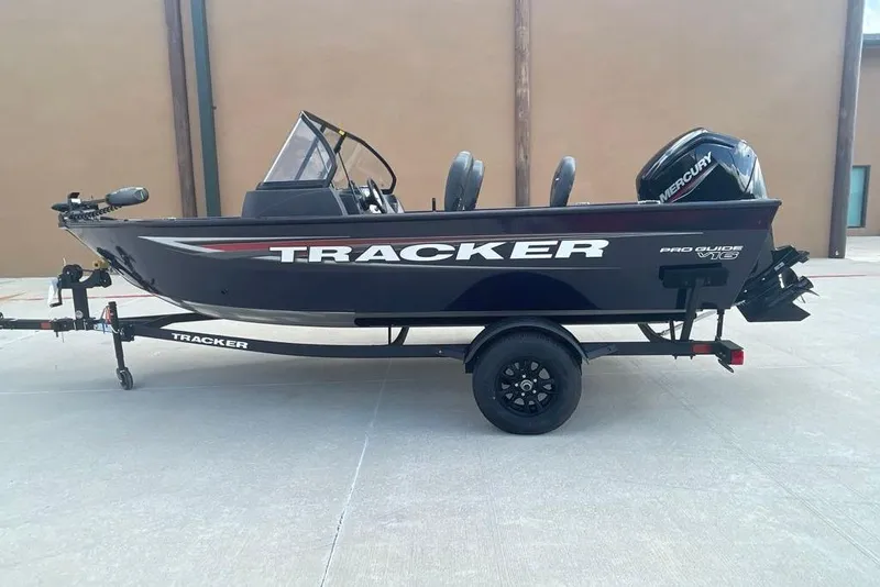 The Image of 2026 Tracker Pro Guide V-16 WT boat on trailer, side view. - 0