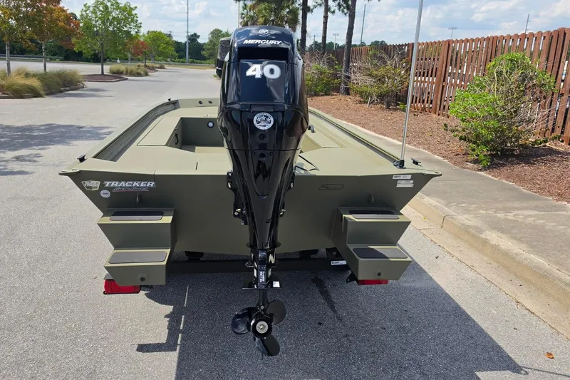 Slide: The Image of 2026 Tracker Grizzly 1654 T Sportsman boat with Mercury 40 outboard motor. - 4