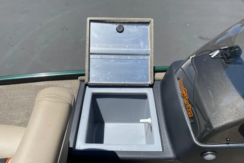 Slide: The Image of Open storage compartment on 2026 Tracker Bass Tracker Classic Limited boat. - 6