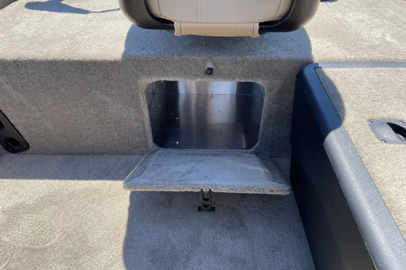 Slide: The Image of 2026 Tracker Bass Tracker Classic Limited boat interior storage compartment. - 11
