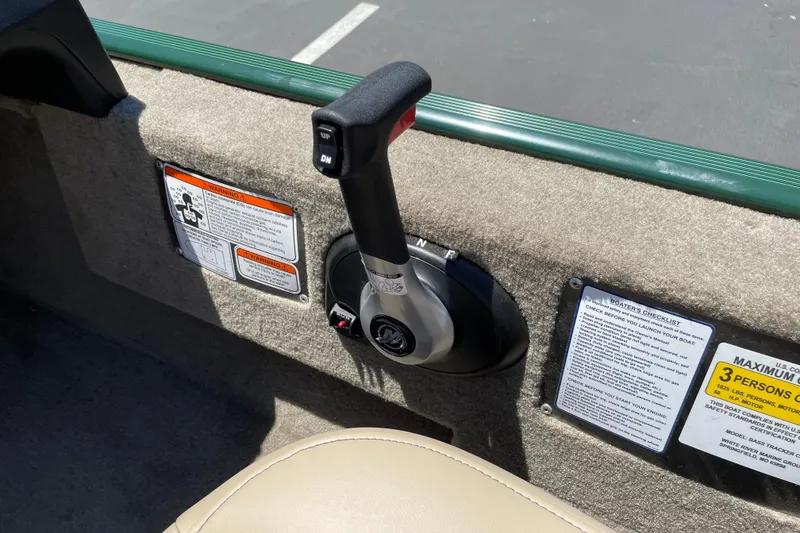 Slide: The Image of 2026 Tracker Bass Tracker Classic Limited boat throttle and safety instructions. - 13