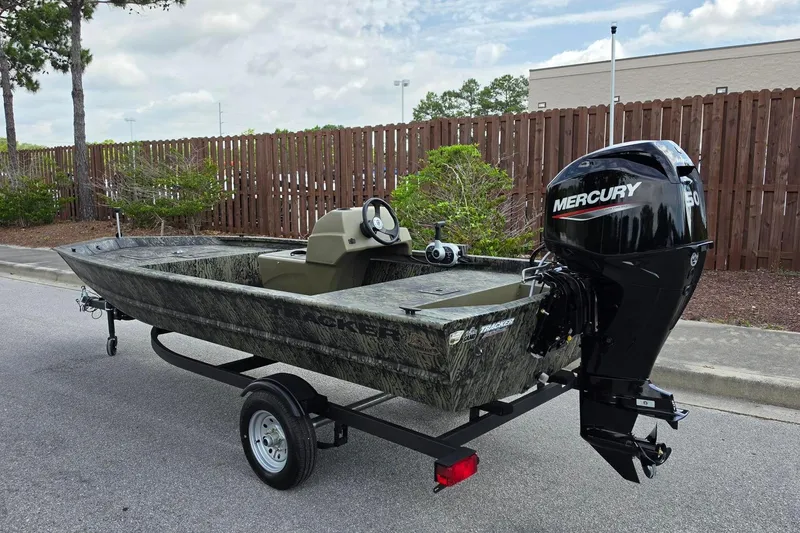 Slide: The Image of 2026 Tracker Grizzly 1648 SC boat with Mercury engine on trailer. - 10