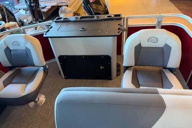 Slide: The Image of Interior of 2026 Sun Tracker Fishin' Barge 22 DLX with seating and console. - 12