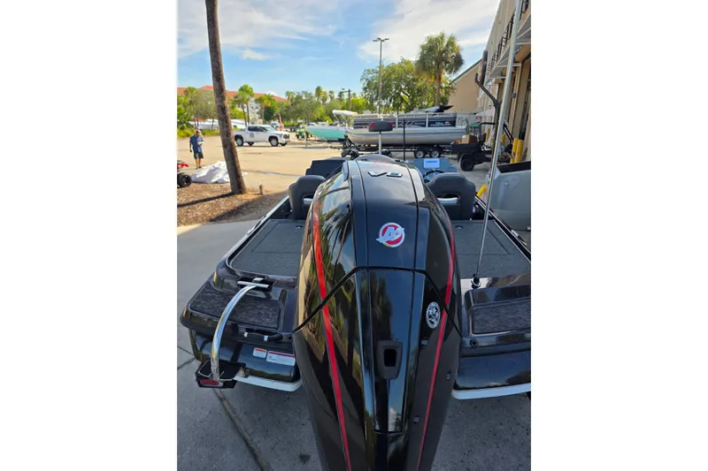 Slide: The Image of 2026 Nitro Z20 XL boat with powerful engine, parked outdoors on a sunny day. - 3