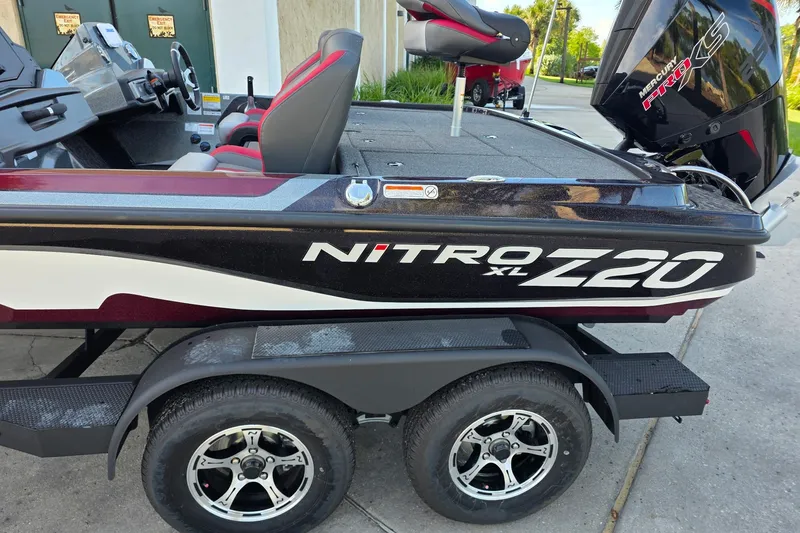 Slide: The Image of 2026 Nitro Z20 XL boat on trailer, featuring sleek design and Mercury Pro XS engine. - 1