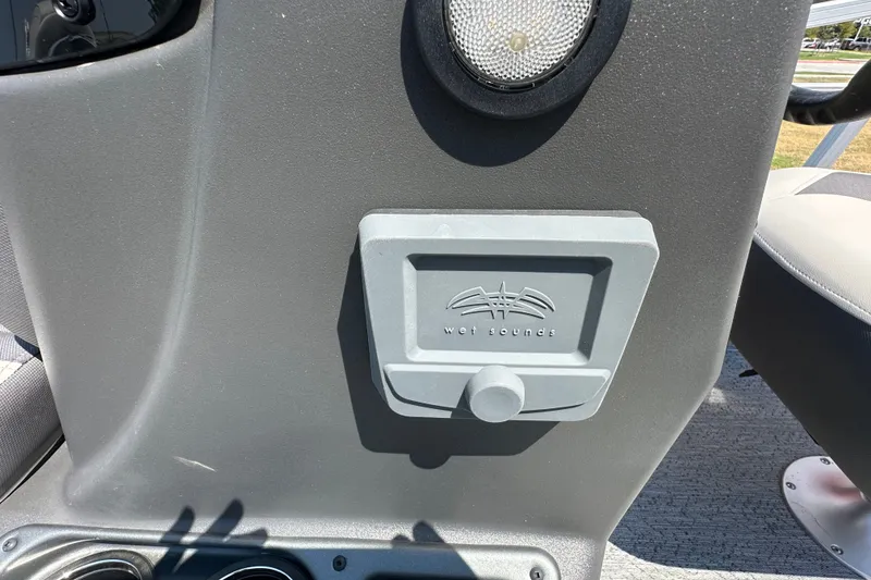 Slide: The Image of Wet Sounds audio control on 2026 Sun Tracker Bass Buggy 18 DLX boat console. - 36