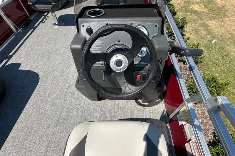 Slide: The Image of Steering console of 2026 Sun Tracker Bass Buggy 18 DLX pontoon boat. - 34