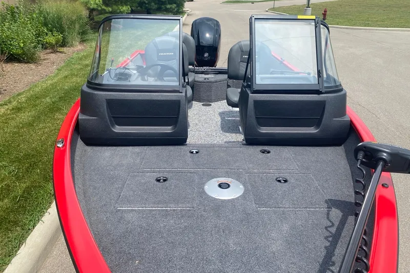 Slide: The Image of 2026 Tracker Pro Guide V-16 WT boat with dual windshields and spacious deck. - 3