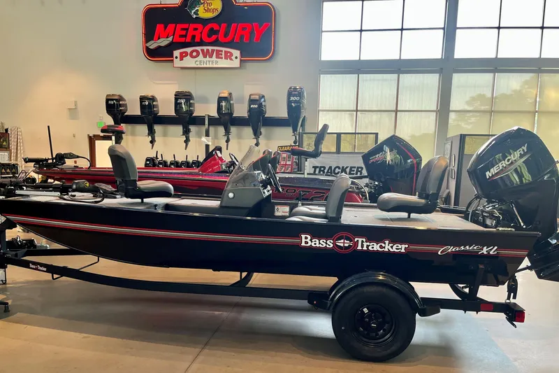 The Image of 2026 Tracker Bass Tracker Classic XL boat displayed indoors at Mercury Power Center. - 0