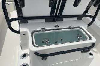 Slide: The Image of 2026 Ranger 2360 Bay boat with livewell and rod holders. - 4