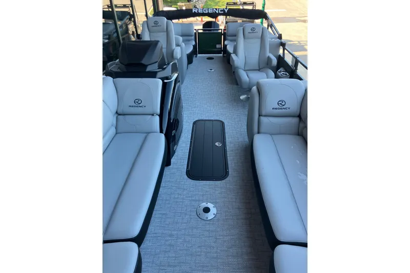 Slide: The Image of 2026 Regency 230 DL boat interior with luxurious seating and modern design. - 6