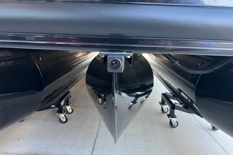 Slide: The Image of Rear view camera on 2026 Regency 230 DL pontoon boat, highlighting sleek design. - 5