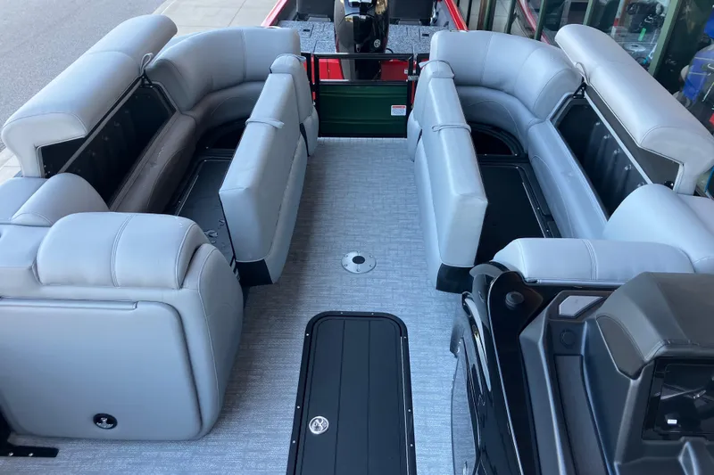 Slide: The Image of Interior of 2026 Regency 230 DL pontoon boat with spacious seating and modern design. - 9