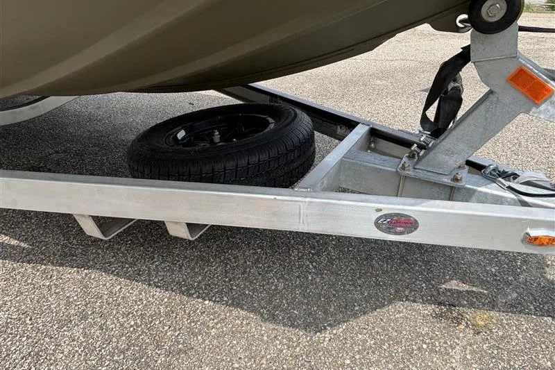 Slide: The Image of Trailer for 2026 Tracker Grizzly 1756 T Marsh boat with spare tire. - 17