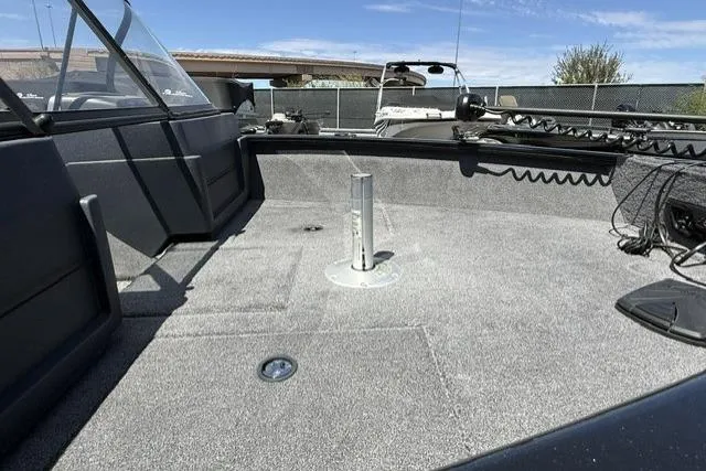 Slide: The Image of 2025 Tracker Pro Guide V-175 WT boat interior with spacious deck and modern features. - 9