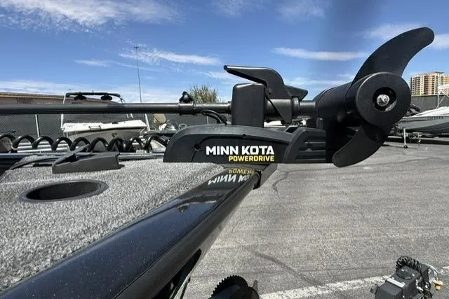 Slide: The Image of Minn Kota PowerDrive on 2025 Tracker Pro Guide V-175 WT boat, outdoor setting. - 10