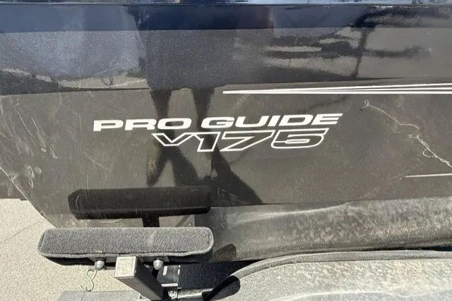 Slide: The Image of 2025 Tracker Pro Guide V-175 WT boat exterior with model branding visible. - 4