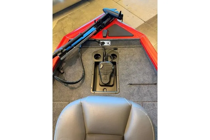 Slide: The Image of 2026 Tracker Pro Team 175 boat interior with trolling motor and foot pedal controls. - 10