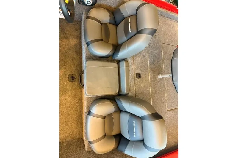 Slide: The Image of 2026 Tracker Pro Team 175 boat seats, gray and black upholstery, top view. - 11