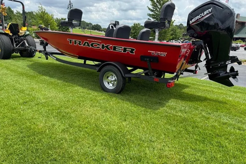 Slide: The Image of 2026 Tracker Pro Team 175 Crappie Edition boat on grass with Mercury engine. - 4