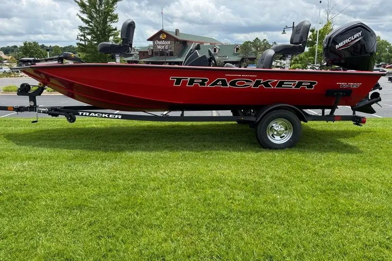 Slide: The Image of 2026 Tracker Pro Team 175 Crappie Edition boat on trailer, parked on grass. - 5
