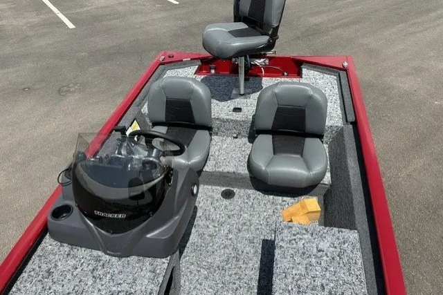 Slide: The Image of 2026 Tracker Pro 170 boat interior with gray seating and steering console. - 17