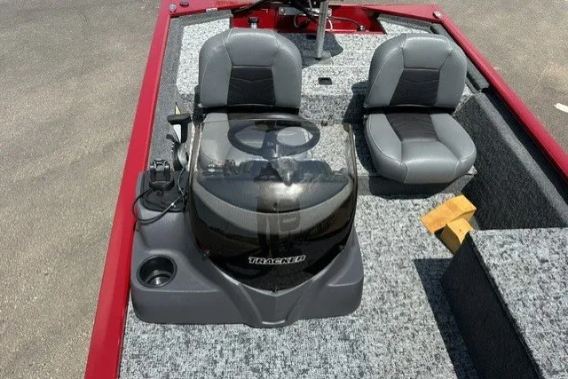 Slide: The Image of 2026 Tracker Pro 170 boat interior with dual gray seats and steering console. - 15