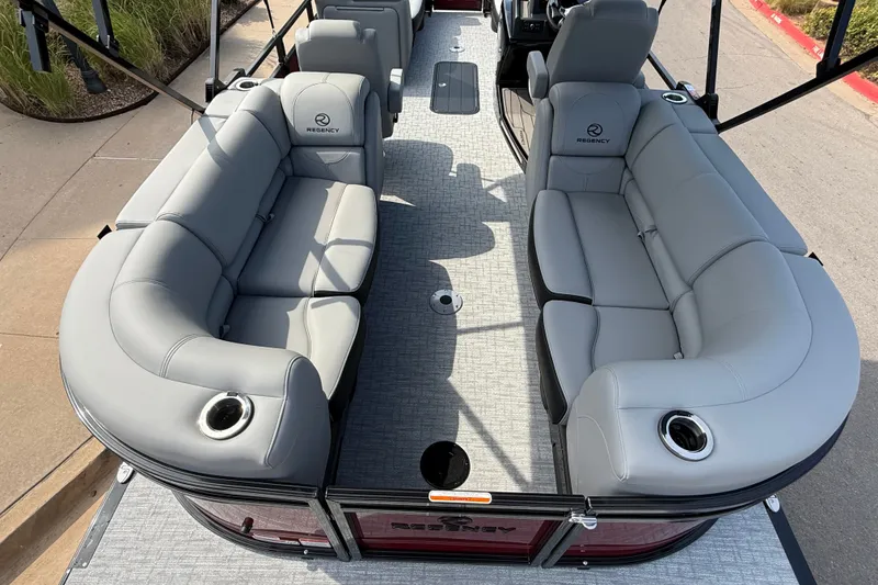 Slide: The Image of 2026 Regency 230 DL pontoon boat with spacious gray seating and modern design. - 8