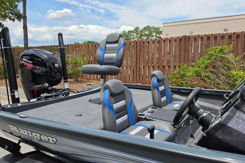 Slide: The Image of 2026 Ranger RT188P boat with Mercury Pro XS engine, featuring blue and gray seating. - 14