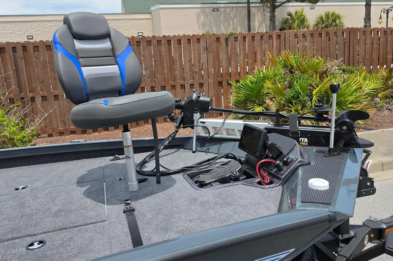 Slide: The Image of 2026 Ranger RT188P boat deck with seat, control panel, and trolling motor. - 15
