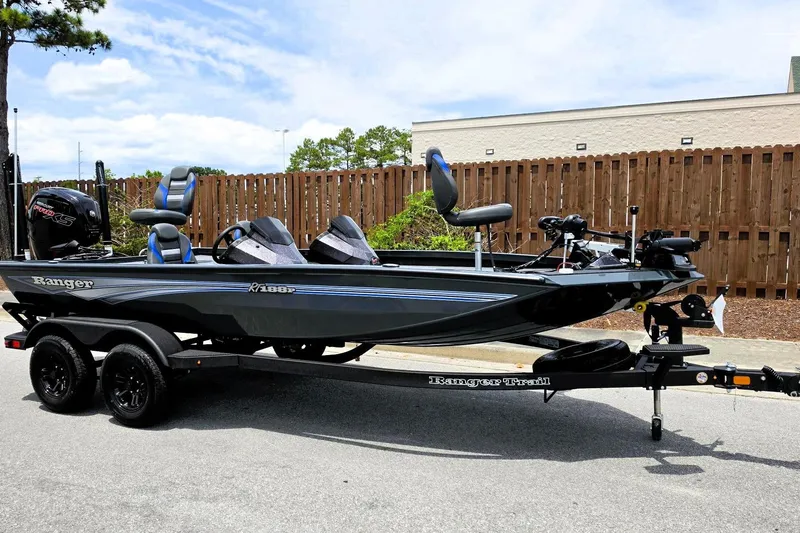 Slide: The Image of 2026 Ranger RT188P fishing boat on trailer, parked outdoors. - 3