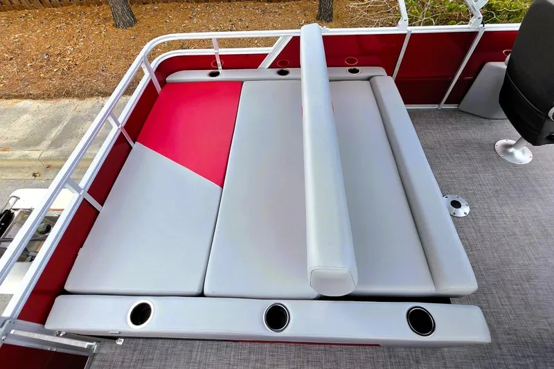Slide: The Image of 2026 Sun Tracker Party Barge 22 RF DLX with spacious seating and cup holders. - 19