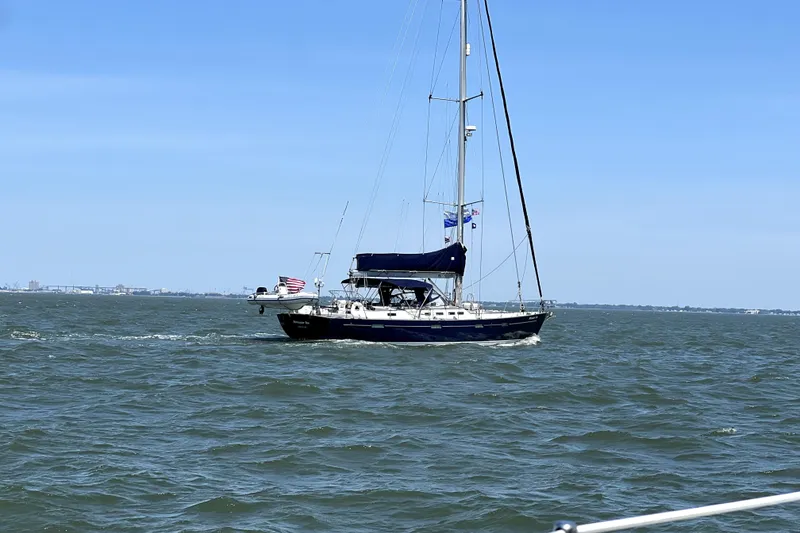 The Image of Sailing yacht Beneteau 57, 2005 model, cruising on open water under clear skies. - 0