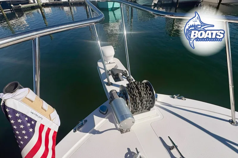 Slide: The Image of 2022 Steiger Craft 28 Miami boat deck with anchor chain and American flag. - 5
