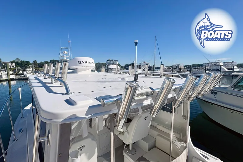 Slide: The Image of 2022 Steiger Craft 28 Miami boat with rod holders and Garmin equipment at marina. - 7
