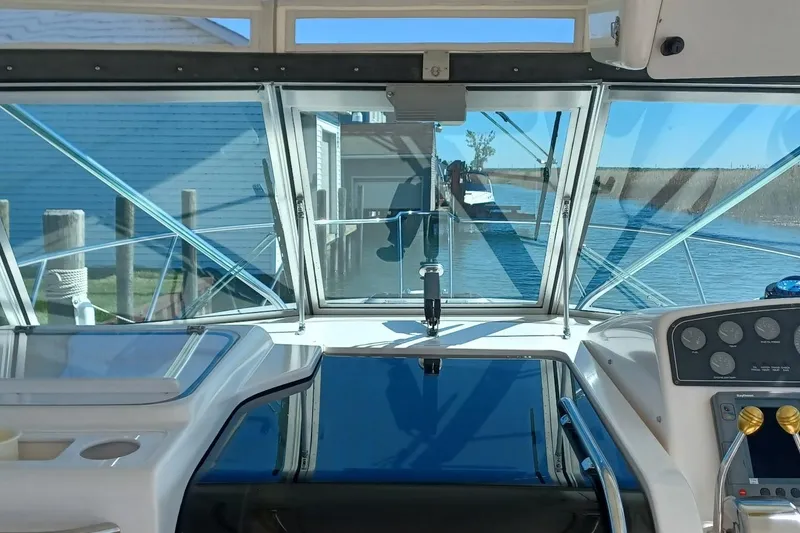Slide: The Image of Close-up of 2001 Pursuit 3400 Express boat dashboard gauges. - 17