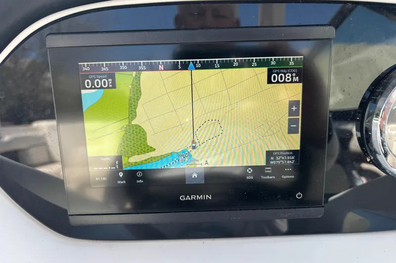 Slide: The Image of Garmin GPS display on 2008 Sea Ray 270 Sundeck showing navigation map and coordinates. - 26