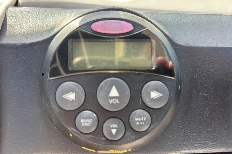 Slide: The Image of Audio control panel on a 2008 Sea Ray 270 Sundeck boat dashboard. - 27