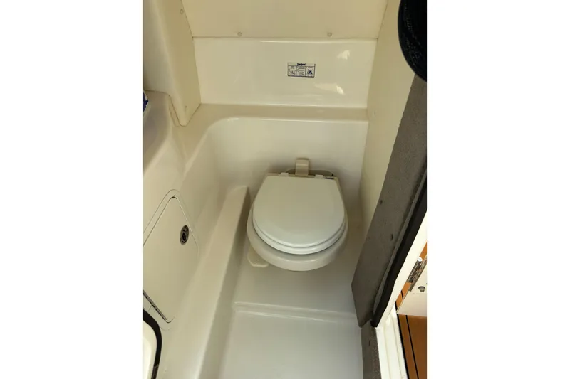 Slide: The Image of 2008 Sea Ray 270 Sundeck Head Compartment - 36