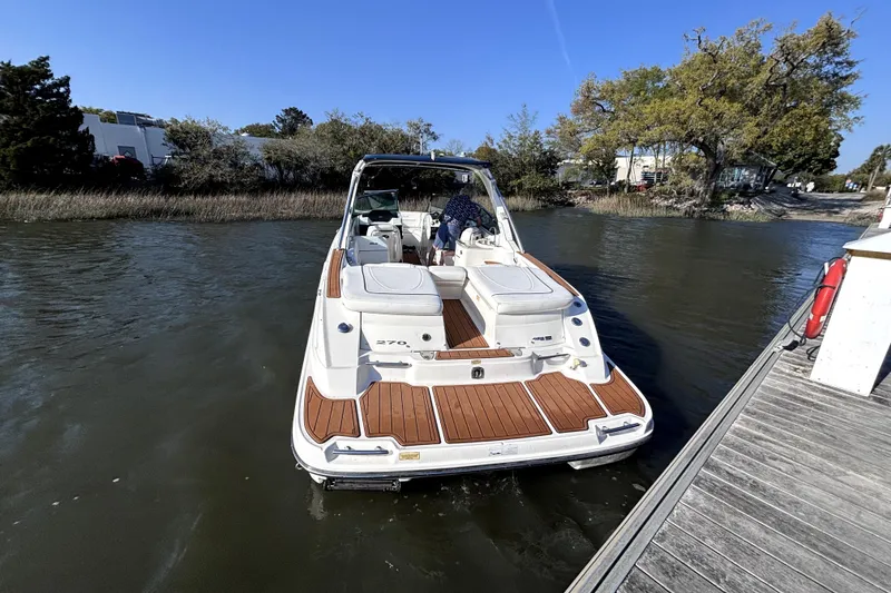 Slide: The Image of 2008 Sea Ray 270 Sundeck swim platform, swim ladder, ski tow hook, sundpad and companionway to cockpit - 4