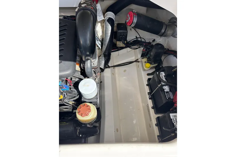 Slide: The Image of Engine compartment of a 2008 Sea Ray 270 Sundeck showing clean bilge and mechanicals on port side - 40
