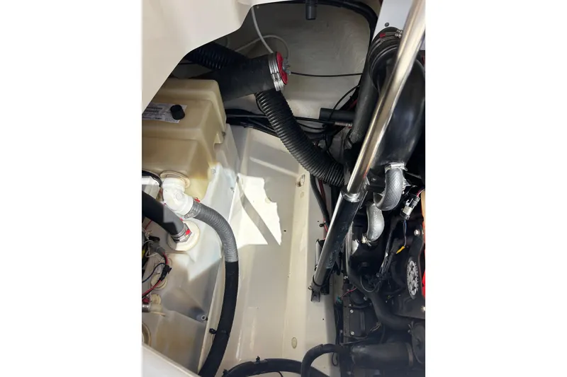 Slide: The Image of Engine compartment of a 2008 Sea Ray 270 Sundeck boat, showing clean bilge, hoses and components on starboard side - 41