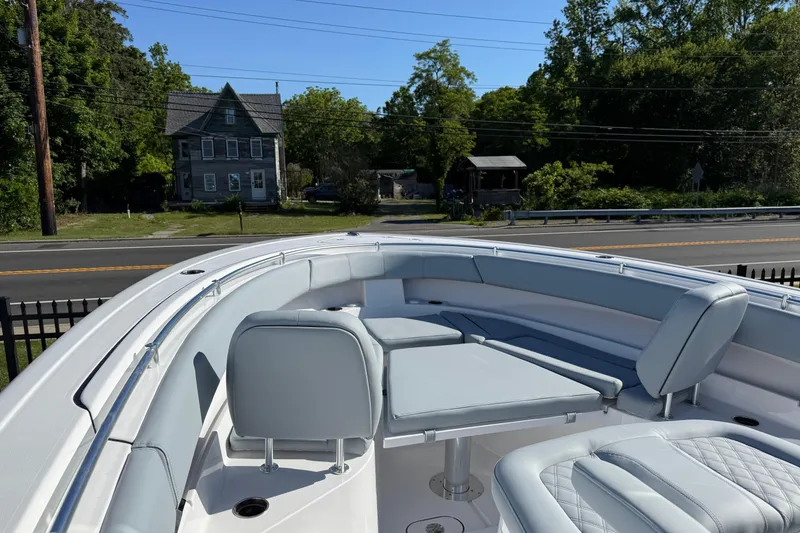 Slide: The Image of 2026 Sportsman Open 322 Center Console boat with spacious seating and sleek design. - 5